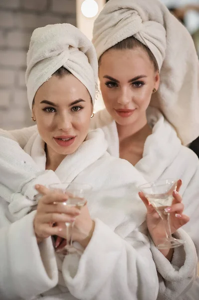 Two Beautiful Women Bathrobe Towel White Background — Stock fotografie