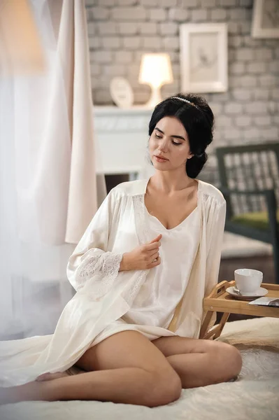 Beautiful Young Woman White Shirt Black Dress Sitting Bed Looking — Fotografia de Stock