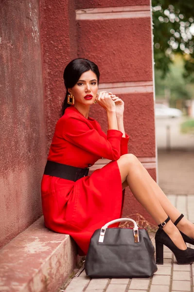Beautiful Young Woman Red Dress Black Leather Jacket Sunglasses Posing — Φωτογραφία Αρχείου