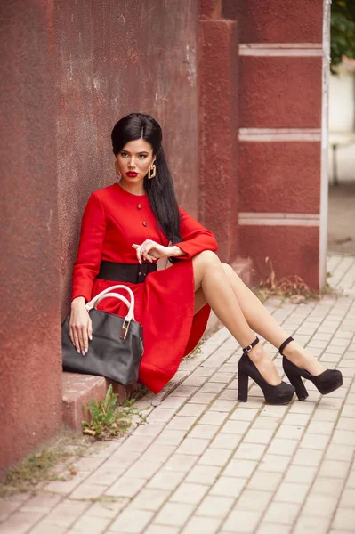 Beautiful Young Woman Red Dress Black Leather Jacket Sunglasses Posing — Zdjęcie stockowe