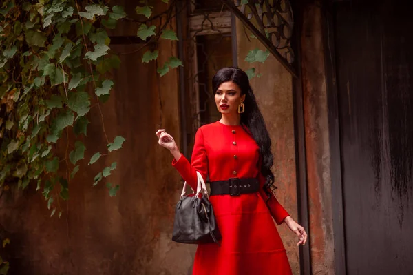 Beautiful Young Woman Red Dress Black Leather Jacket Hat Posing — Φωτογραφία Αρχείου