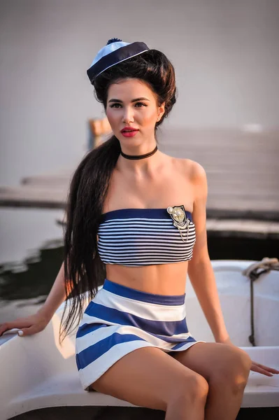 beautiful woman on yacht near the sea