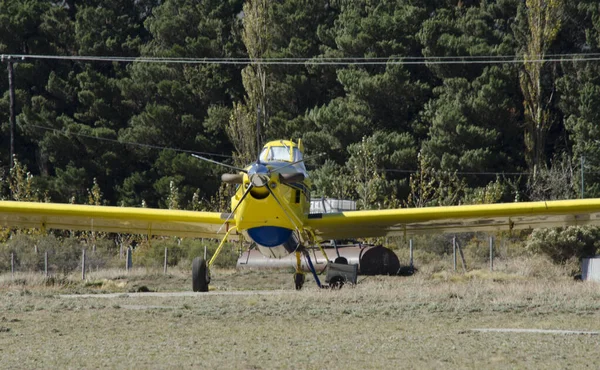 yellow propeller plane, stunt plane
