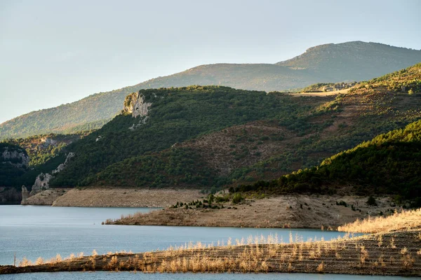  View of the Itoiz reservoir in Navarra, very empty due to the summer drought. High quality photo