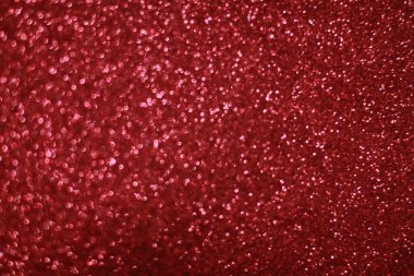 Bokeh odaklı ışıklarla kırmızı parıltılı soyut arkaplan