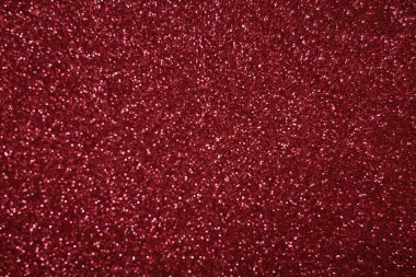 Bokeh odaklı ışıklarla kırmızı parıltılı soyut arkaplan