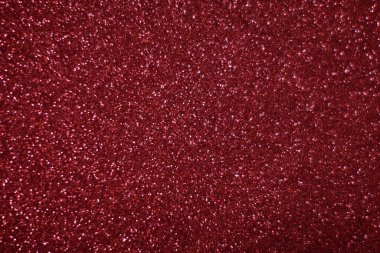 Bokeh odaklı ışıklarla kırmızı parıltılı soyut arkaplan