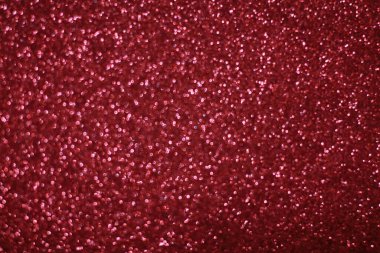 Bokeh odaklı ışıklarla kırmızı parıltılı soyut arkaplan