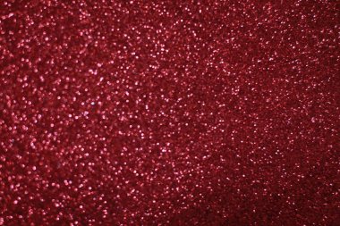 Bokeh odaklı ışıklarla kırmızı parıltılı soyut arkaplan