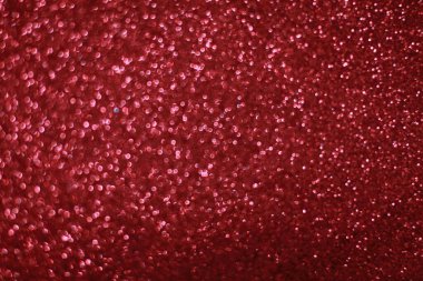 Bokeh odaklı ışıklarla kırmızı parıltılı soyut arkaplan