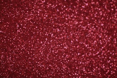 Bokeh odaklı ışıklarla kırmızı parıltılı soyut arkaplan