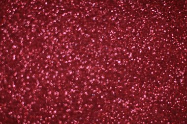 Bokeh odaklı ışıklarla kırmızı parıltılı soyut arkaplan