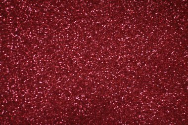 Bokeh odaklı ışıklarla kırmızı parıltılı soyut arkaplan