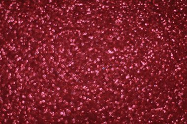 Bokeh odaklı ışıklarla kırmızı parıltılı soyut arkaplan