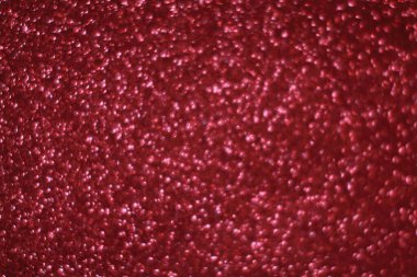 Bokeh odaklı ışıklarla kırmızı parıltılı soyut arkaplan