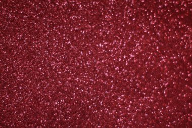 Bokeh odaklı ışıklarla kırmızı parıltılı soyut arkaplan