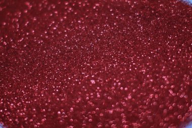 Bokeh odaklı ışıklarla kırmızı parıltılı soyut arkaplan