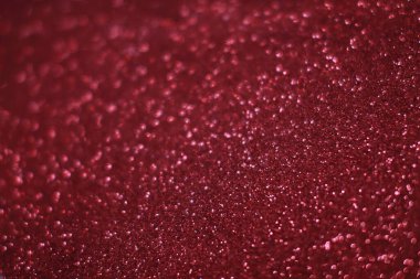 Bokeh odaklı ışıklarla kırmızı parıltılı soyut arkaplan