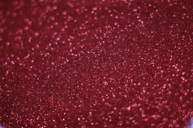 Bokeh odaklı ışıklarla kırmızı parıltılı soyut arkaplan