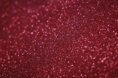 Bokeh odaklı ışıklarla kırmızı parıltılı soyut arkaplan