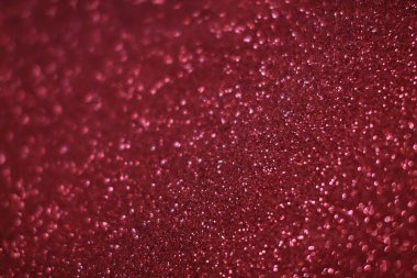 Bokeh odaklı ışıklarla kırmızı parıltılı soyut arkaplan