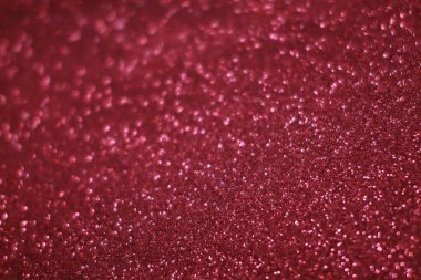 Bokeh odaklı ışıklarla kırmızı parıltılı soyut arkaplan