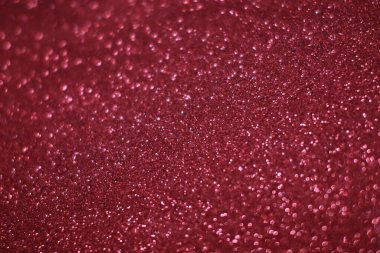 Bokeh odaklı ışıklarla kırmızı parıltılı soyut arkaplan