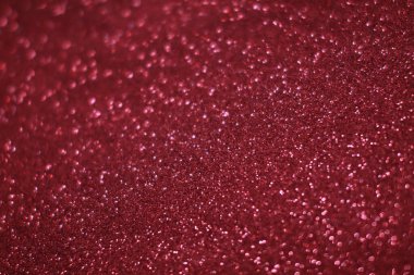 Bokeh odaklı ışıklarla kırmızı parıltılı soyut arkaplan