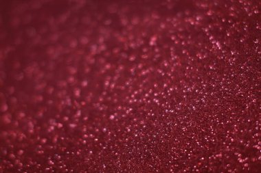 Bokeh odaklı ışıklarla kırmızı parıltılı soyut arkaplan