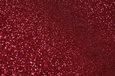 Bokeh odaklı ışıklarla kırmızı parıltılı soyut arkaplan