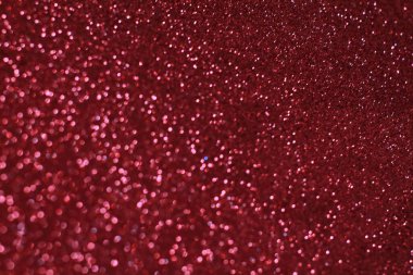 Bokeh odaklı ışıklarla kırmızı parıltılı soyut arkaplan