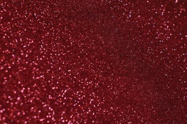 Bokeh odaklı ışıklarla kırmızı parıltılı soyut arkaplan