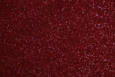 Bokeh odaklı ışıklarla kırmızı parıltılı soyut arkaplan