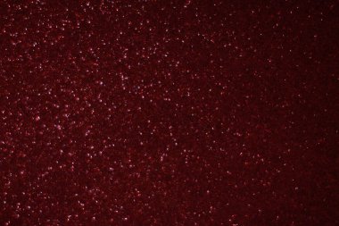 Bokeh odaklı ışıklarla kırmızı parıltılı soyut arkaplan