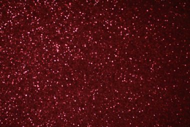 Bokeh odaklı ışıklarla kırmızı parıltılı soyut arkaplan