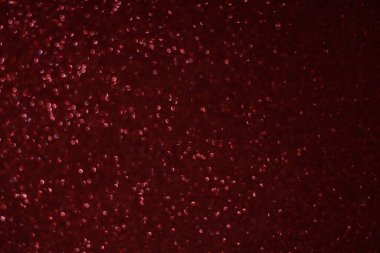 Bokeh odaklı ışıklarla kırmızı parıltılı soyut arkaplan