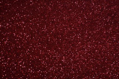 Bokeh odaklı ışıklarla kırmızı parıltılı soyut arkaplan