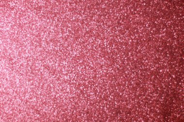 Pembe parıltılı soyut arkaplan ve Bokeh odaklı ışıklar