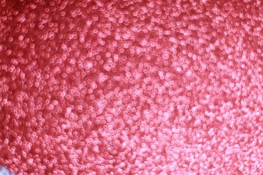 Pembe parıltılı soyut arkaplan ve Bokeh odaklı ışıklar