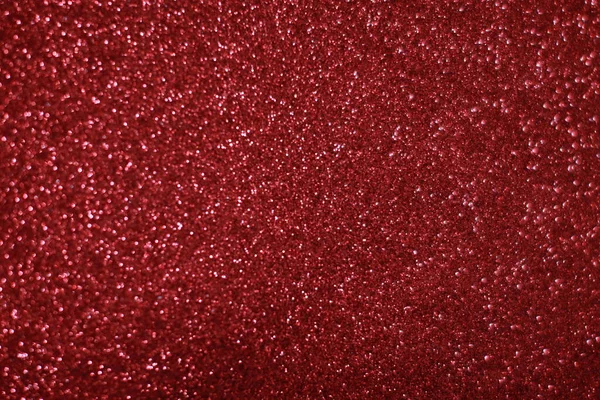 Bokeh odaklı ışıklarla kırmızı parıltılı soyut arkaplan