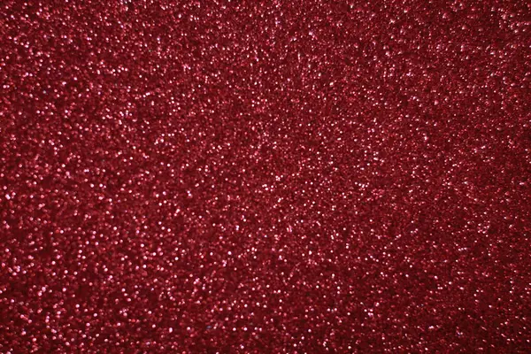 Bokeh odaklı ışıklarla kırmızı parıltılı soyut arkaplan