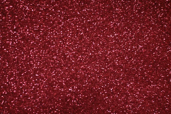 Bokeh odaklı ışıklarla kırmızı parıltılı soyut arkaplan