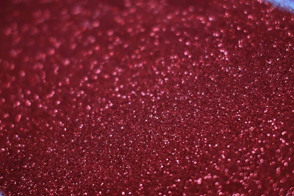 Bokeh odaklı ışıklarla kırmızı parıltılı soyut arkaplan