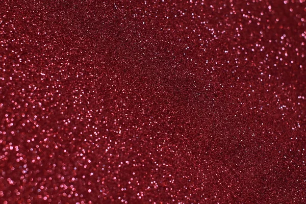 Bokeh odaklı ışıklarla kırmızı parıltılı soyut arkaplan