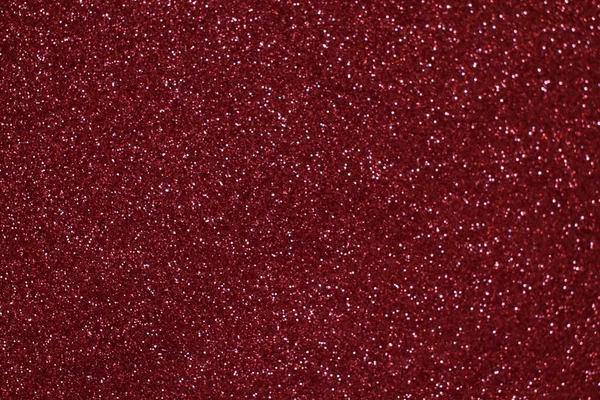 Bokeh odaklı ışıklarla kırmızı parıltılı soyut arkaplan