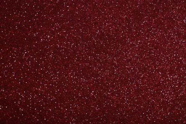 Bokeh odaklı ışıklarla kırmızı parıltılı soyut arkaplan