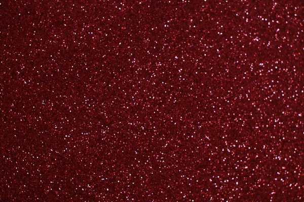 Bokeh odaklı ışıklarla kırmızı parıltılı soyut arkaplan