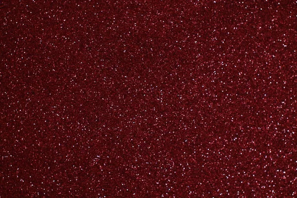 Bokeh odaklı ışıklarla kırmızı parıltılı soyut arkaplan