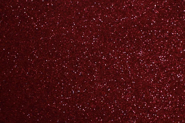 Bokeh odaklı ışıklarla kırmızı parıltılı soyut arkaplan