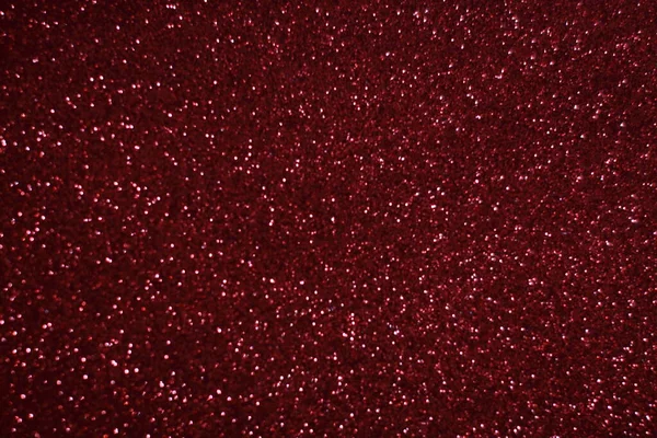 Bokeh odaklı ışıklarla kırmızı parıltılı soyut arkaplan